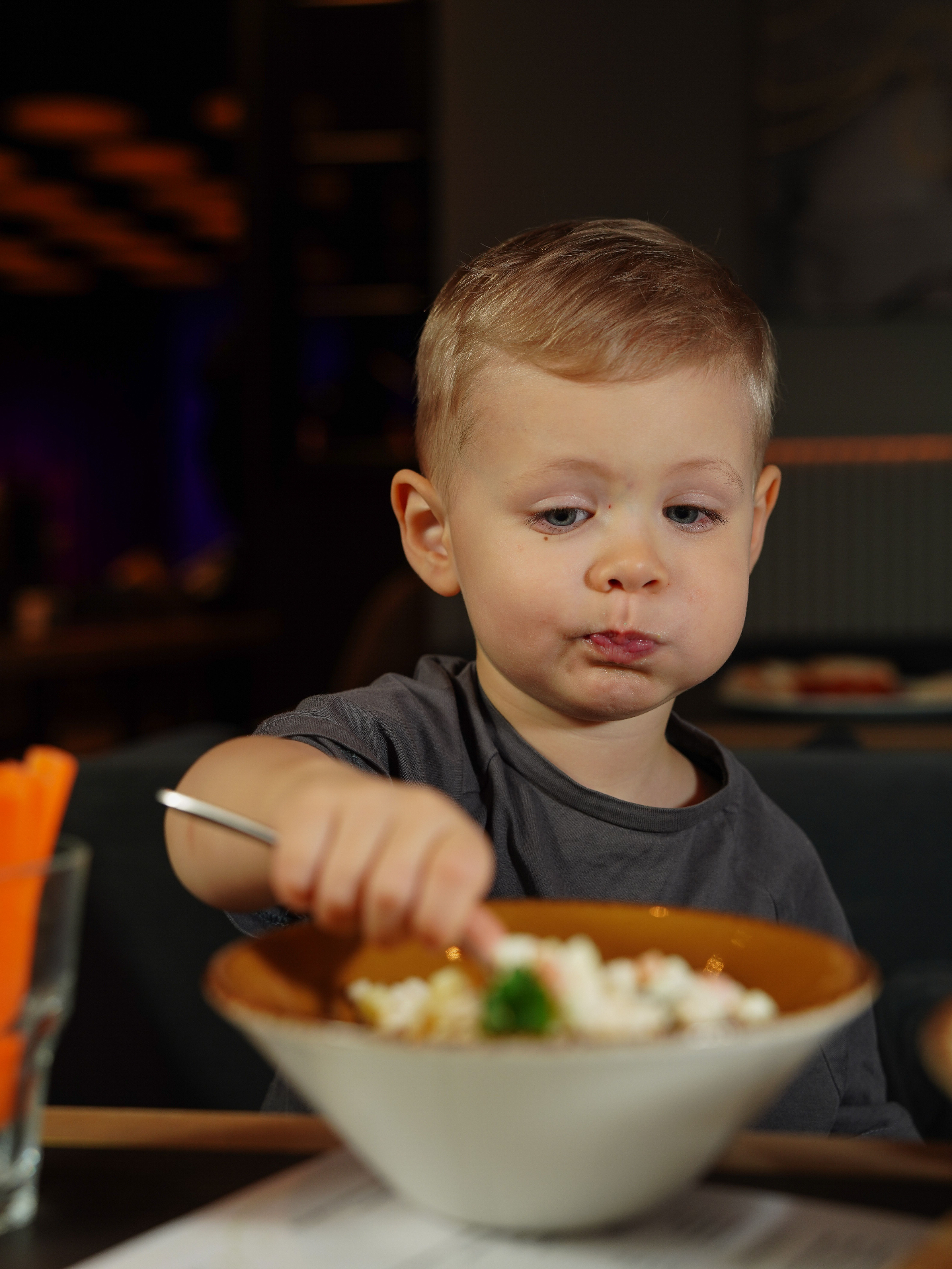 Young boy enjoying a kids meal at Hammerman's restaurant in Aberdeen