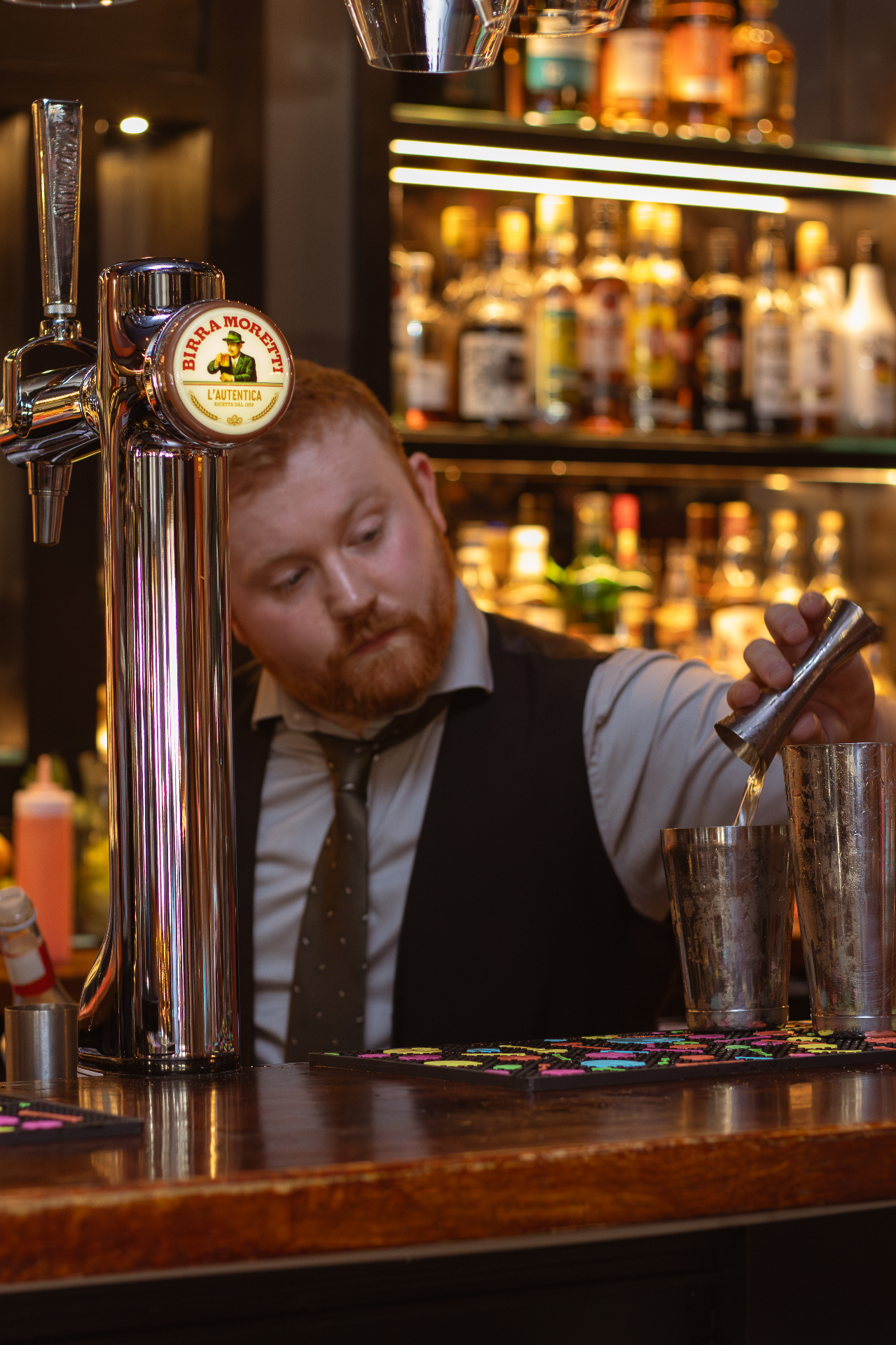 Bartender crafting cocktails