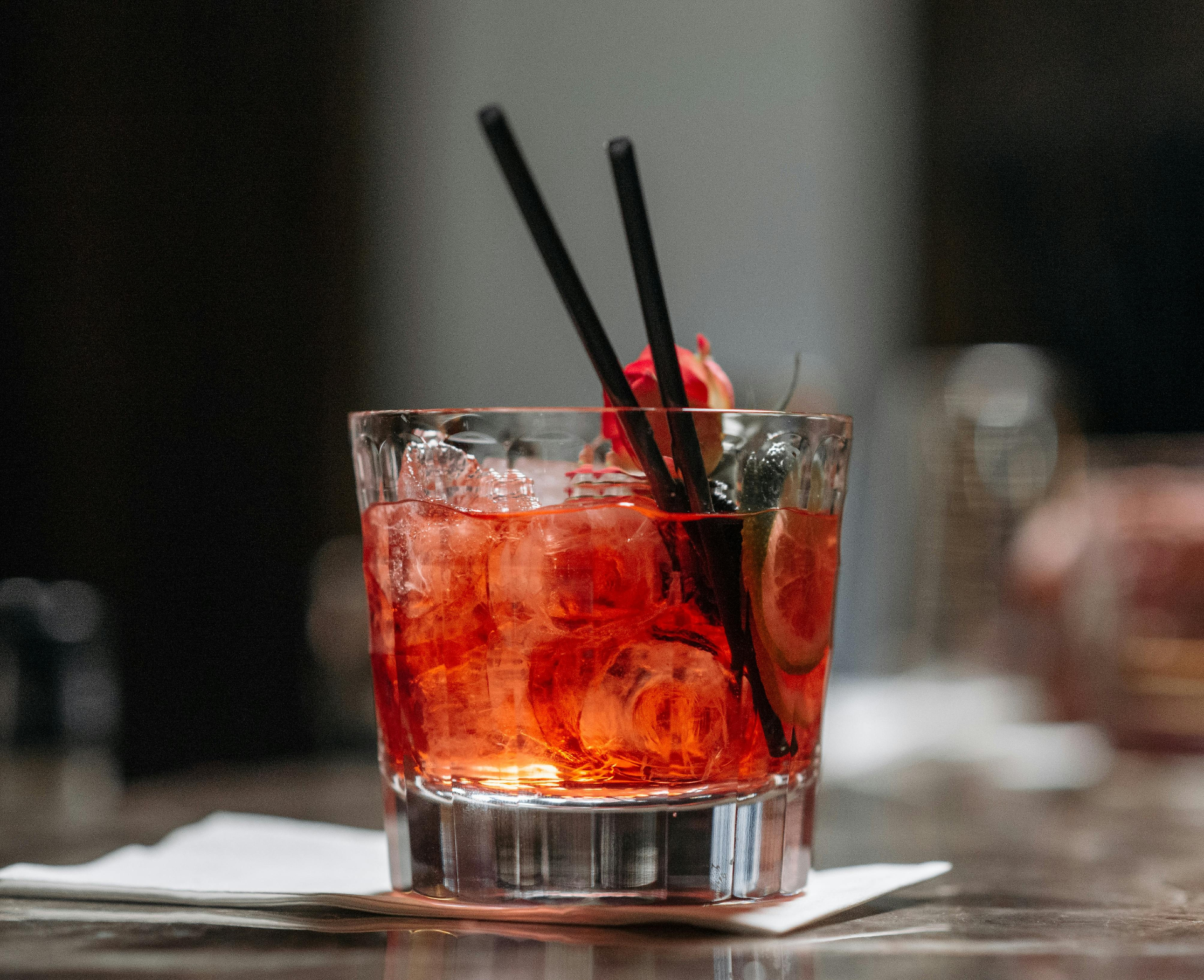 Craft cocktail with rosemary garnish